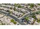 An aerial view of homes in a residential neighborhood with neatly landscaped yards and community streets at 1413 E San Remo Ave, Gilbert, AZ 85234