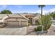 Well-maintained home featuring desert landscaping, tile roof, and a two-car garage at 1413 E San Remo Ave, Gilbert, AZ 85234