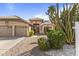 Charming home with a well-manicured front yard and two-car garage at 1413 E San Remo Ave, Gilbert, AZ 85234