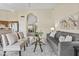 Bright and airy living room with a seamless transition to the kitchen and an inviting entrance at 1413 E San Remo Ave, Gilbert, AZ 85234