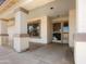 Covered front porch with a security screen door and decorative columns for added curb appeal at 17210 N Cassi Dr, Surprise, AZ 85374