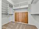 Spacious walk-in closet with built-in shelving for ample storage space at 17210 N Cassi Dr, Surprise, AZ 85374