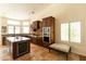 Spacious kitchen features a large island, custom cabinetry, and stainless steel appliances at 18907 N 92Nd Way, Scottsdale, AZ 85255