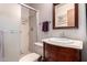 Updated bathroom with glass shower, marble countertop and vanity at 1907 E Huber St, Mesa, AZ 85203