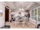 Bright office space with decorative ceiling, shutters, built-in shelving and desk at 1907 E Huber St, Mesa, AZ 85203