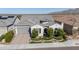 A charming single-story home with mature landscaping and a beautiful mountain view at 19215 N 259Th Ave, Buckeye, AZ 85396