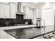 Well-equipped kitchen with stainless steel appliances, granite countertops, and modern fixtures at 19215 N 259Th Ave, Buckeye, AZ 85396