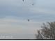 Sky view with hot air balloons floating in the sky at 19215 N 259Th Ave, Buckeye, AZ 85396