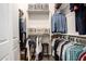 Organized walk-in closet with shelves, rods, and storage boxes for maximum space and convenience at 19215 N 259Th Ave, Buckeye, AZ 85396