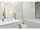 Bright half bathroom features white fixtures, vanity with sink and light gray paint at 1961 N Hartford St # 1087, Chandler, AZ 85225