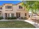 Charming home featuring a well-maintained lawn and inviting front entrance on a sunny day at 1961 N Hartford St # 1087, Chandler, AZ 85225