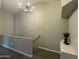 Bright stairway landing leading to upper level at 1961 N Hartford St # 1087, Chandler, AZ 85225