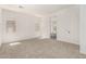 Bright bedroom with ensuite bathroom and ample light from two windows at 20255 W Monterey Way, Buckeye, AZ 85396