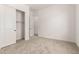 Neutral bedroom with a large closet and door to adjacent space at 20255 W Monterey Way, Buckeye, AZ 85396