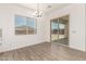Bright dining area with large window and sliding glass door, perfect for entertaining at 20255 W Monterey Way, Buckeye, AZ 85396