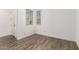 Clean, empty room featuring tile flooring, neutral walls, and natural light at 20255 W Monterey Way, Buckeye, AZ 85396