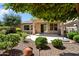 Charming backyard featuring a covered patio and lush landscaping for serene outdoor living at 20523 N 267Th Ln, Buckeye, AZ 85396