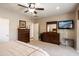 Spacious main bedroom with carpeted floors, ceiling fan and wood furniture at 20523 N 267Th Ln, Buckeye, AZ 85396