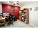 Functional home office area with ample storage, a ceiling fan and a comfortable workspace at 20523 N 267Th Ln, Buckeye, AZ 85396
