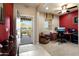 Comfortable office space with a ceiling fan, a front view and a desk setup at 20523 N 267Th Ln, Buckeye, AZ 85396