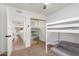 Bunkbed with pullout sofa in bedroom with a view of the hallway at 2109 W El Alba Way, Chandler, AZ 85224