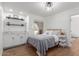 Charming bedroom featuring stylish accents, wood flooring, and abundant natural light at 2109 W El Alba Way, Chandler, AZ 85224