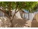 Low maintenance yard with mature tree and a metal storage shed for all your outdoor gear at 2109 W El Alba Way, Chandler, AZ 85224