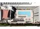 Aerial view of the rooftop pool area, complete with lounge chairs, seating, and shade at 2300 E Campbell Ave # 106, Phoenix, AZ 85016