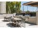 Outdoor grill area features stainless steel grills, sink, and countertop space, perfect for entertaining guests at 2300 E Campbell Ave # 106, Phoenix, AZ 85016