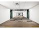 Well-lit hallway with contemporary design, showcasing clean lines and modern fixtures at 2300 E Campbell Ave # 106, Phoenix, AZ 85016