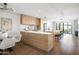 Spacious kitchen with breakfast bar that opens to an outdoor living area at 2300 E Campbell Ave # 106, Phoenix, AZ 85016
