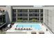 Inviting outdoor pool area with lounge chairs offering a refreshing escape, perfect for relaxation at 2300 E Campbell Ave # 106, Phoenix, AZ 85016