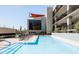 Stunning outdoor pool with lounge chairs and inviting blue water, ideal for warm days at 2300 E Campbell Ave # 106, Phoenix, AZ 85016