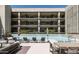 Relaxing outdoor pool area surrounded by lounge chairs and patio seating for ultimate relaxation at 2300 E Campbell Ave # 106, Phoenix, AZ 85016