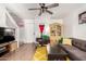 Comfortable living room with a decorative rug, modern furniture, and bright natural light at 2431 E Tracy Ln # 1, Phoenix, AZ 85032