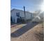 Side view of home with a white exterior at 2637 S Amanda Dr, Maricopa, AZ 85139