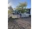 Exterior view of home with white lattice fencing at 2637 S Amanda Dr, Maricopa, AZ 85139