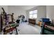 Home office with carpeted floors, neutral paint, and ample natural light at 27053 W Ponderosa Ln, Buckeye, AZ 85396
