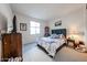 Cozy bedroom with carpeted floors and ample natural light at 27053 W Ponderosa Ln, Buckeye, AZ 85396