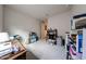 Bright bedroom features carpet and desk and provides a comfortable workspace at 27053 W Ponderosa Ln, Buckeye, AZ 85396