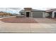Charming single-Gathering home featuring low maintenance desert landscaping and an attached two car garage at 27053 W Ponderosa Ln, Buckeye, AZ 85396