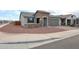Charming single-Gathering home featuring low maintenance desert landscaping and an attached two car garage at 27053 W Ponderosa Ln, Buckeye, AZ 85396