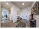 Inviting foyer with tile floors, neutral paint, and decor at 27053 W Ponderosa Ln, Buckeye, AZ 85396