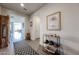 Inviting foyer with tile floors, neutral paint, and view to living spaces at 27053 W Ponderosa Ln, Buckeye, AZ 85396