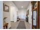 Inviting foyer with tile floors, neutral paint, and ample natural light at 27053 W Ponderosa Ln, Buckeye, AZ 85396