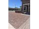 Charming single-story home with meticulously landscaped front yard, complemented by a stone facade and mountain views at 27053 W Ponderosa Ln, Buckeye, AZ 85396
