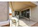Covered patio area with room for dining and outdoor furniture at 27053 W Ponderosa Ln, Buckeye, AZ 85396
