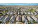 Aerial view of the neighborhood with single Gathering homes and desert landscape at 30954 W Whitton Ave, Buckeye, AZ 85396