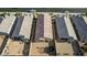 Aerial view of a single-Gathering home with a fenced yard and trampoline at 30954 W Whitton Ave, Buckeye, AZ 85396
