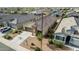 Aerial view of home featuring well-maintained landscaping, desert surroundings and tile roof at 30954 W Whitton Ave, Buckeye, AZ 85396